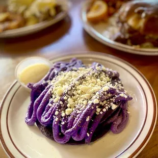 Short stack of Ube Pancakes (not on the menu) but a must get here