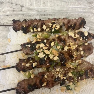 C4. Woven Rice Noodle Sheet and Grilled Pork Skewers