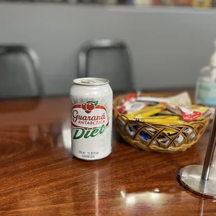 a can of beer on a table