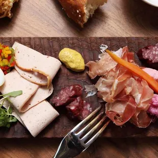 Tables are full at Bacari, have a pint of beer at The Growler Garage our neighbor and call in a order start with a Charcuterie board!