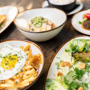 Tapas Dinner Spread - Bacari Fries, Salad, Falafel, Grilled Chicken Breast, Feta Filo