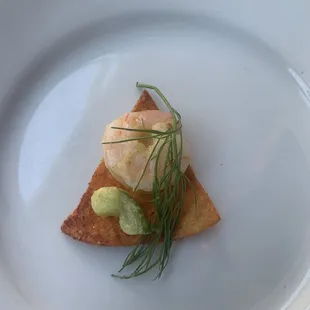 Shrimp ceviche is served with chips. This is one of my bites combining them!