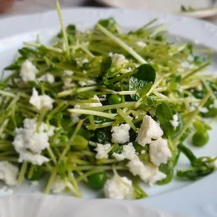 a plate of salad on a table