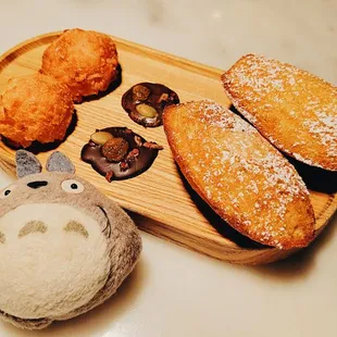 Lemon madeleine, coconut cookie, and raisin chocolate .