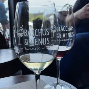 two wine glasses on a table