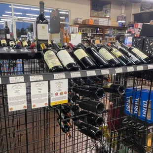 a rack of wine bottles in a store