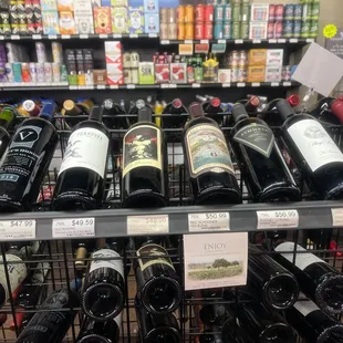 a rack of wine bottles in a store
