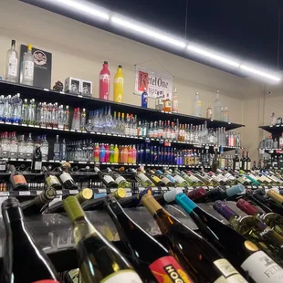 rows of bottles of wine in a liquor store