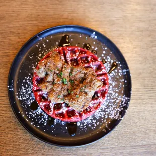 Chicken &amp; Waffles: buttermilk waffle, crispy chicken,
siracha honey