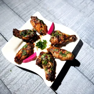 BACCHUS DRUMETTS. The best chicken wings in the DMV. Slowly cooked over charcoal.