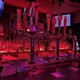 a bar with red lights