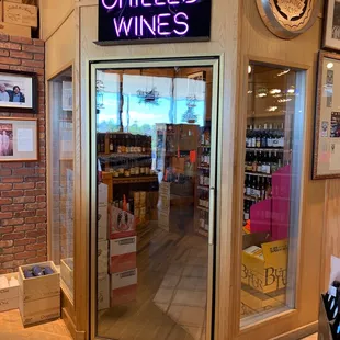 Chilled wine room with sparkling wines and boxed wines