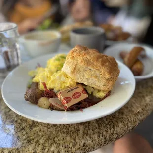 Corned beef and Corned Beef Hash with plenty of corned beef underneath that delightful biscuit