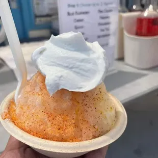 Tropical flavors topped with li hing mui powder and our homemade haupia (coconut) cream