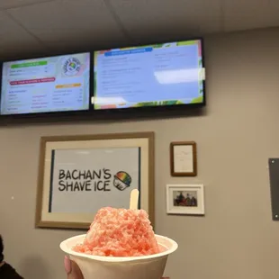 Small strawberry with condensed milk on top!