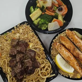 Salmon bowl, Filet mignon rice and noodles with side of veggies.