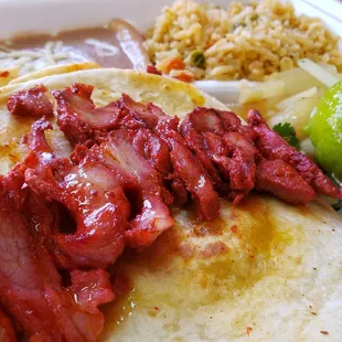 Trompo tacos or tacos al pastor. As you like.