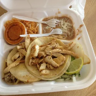 Dine-in (no plastic bag) taco meal:  3 tacos, rice and beans.