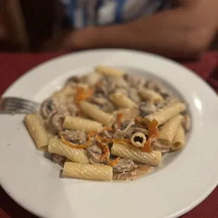 a pasta dish on a white plate