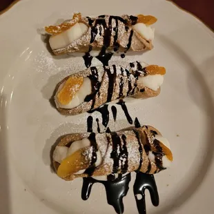 bananas with chocolate sauce and powdered sugar