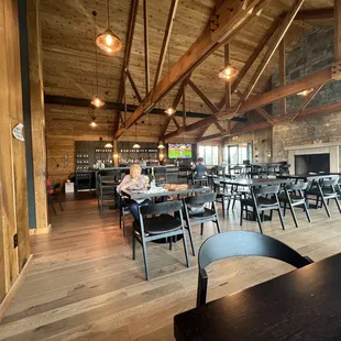 a dining room with tables and chairs