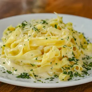 a plate of pasta on a table