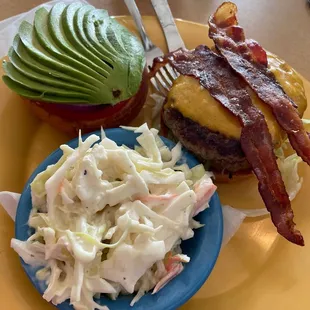 Fully loaded burger with slaw.