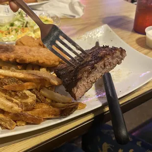 a plate of food and a fork