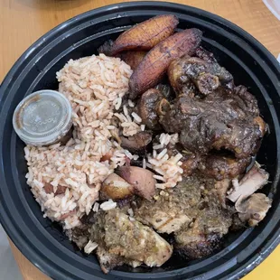 Yard combo - beef oxtail &amp; pork, fried plantains, rice (with beans mixed in it) &amp; backyard sauce