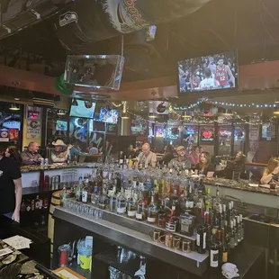 people sitting at the bar