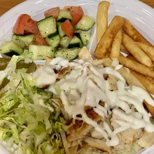 Chicken shawarma plate with salad.