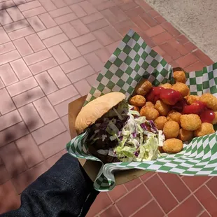 a person holding a basket of food