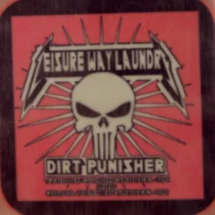 Dirt Punisher, Ad for a local laundromat on a table top.