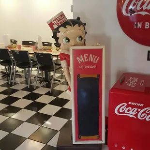 a coke machine and a coke machine