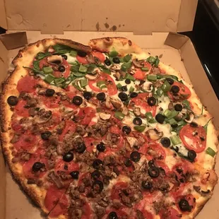 A Large 1/2 &amp; 1/2 Specialty Pizza...Veggie on on side, Norm on the other.