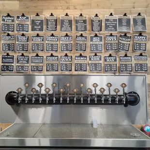 beer taps and menus on the wall