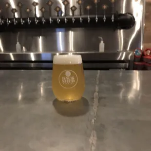 Taster and the taps behind the bar