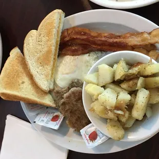 Big breakfast: bacon, sausage, biscuits &amp; gravy, 2 eggs, toast, fried potatoes.