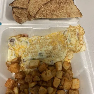 Omelet with house potatoes and toast--yum!