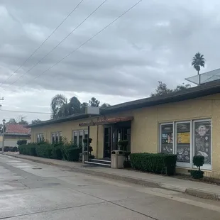 Exterior of the Back Street Grill. Needs a new sign. This is the backside of the Hap Arnold Club.