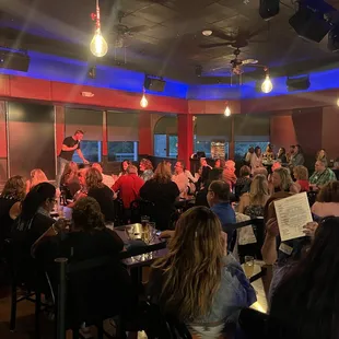  crowd of people sitting at tables