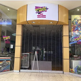 Front entrance with multiple vintage toys.