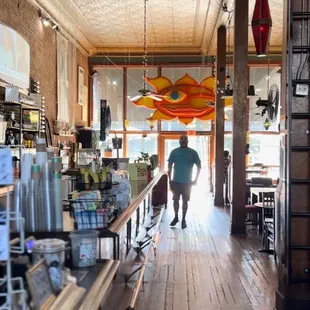 a man walking through a store