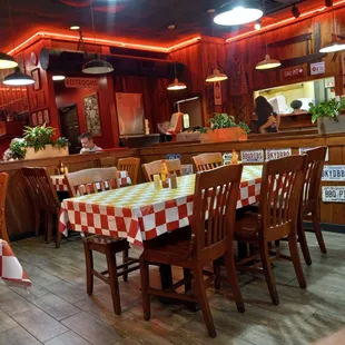 ows tables and chairs in a restaurant