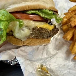 Black Jack Burger with Pepper Jack cheese, added American cheese for extra, added red onion