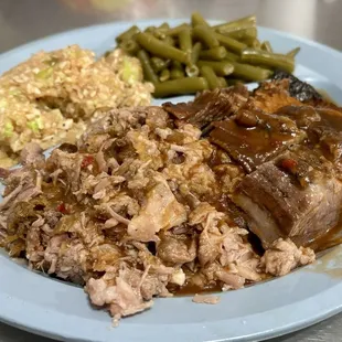 Brisket and chopped pork combo plate with bbq slaw and green beans.
