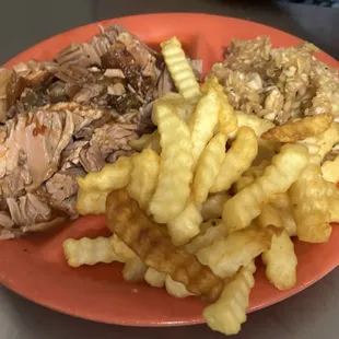 Corse chopped pork with bbq slaw and fries.