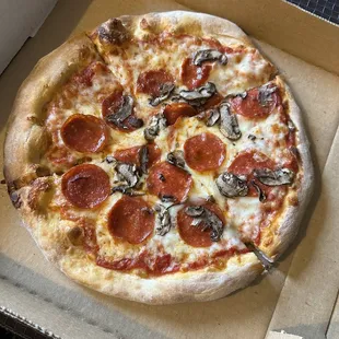 Pepperoni and mushroom pizza.