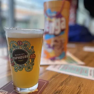 a glass of beer on a table