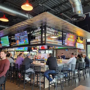 people sitting at the bar